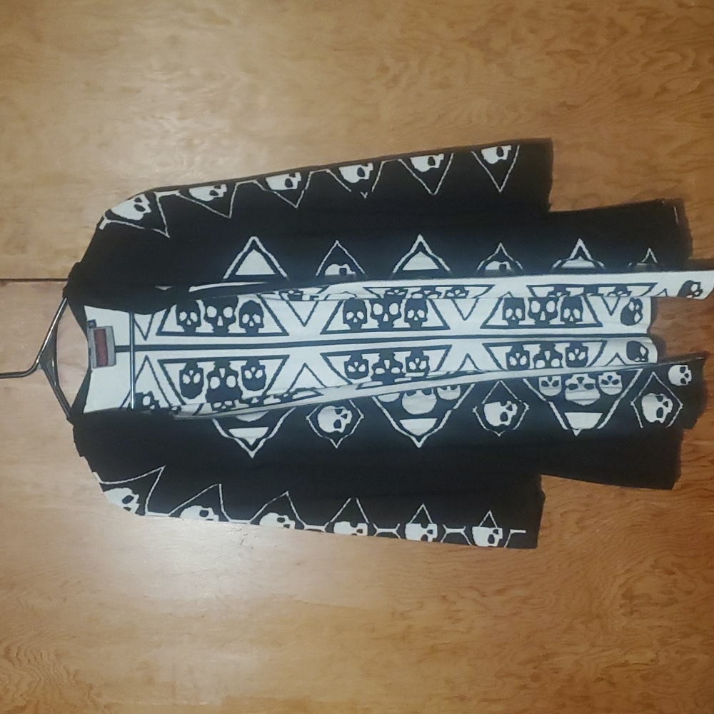 Jawbreaker Skull cardigan with hood size Large Black and white skulls.